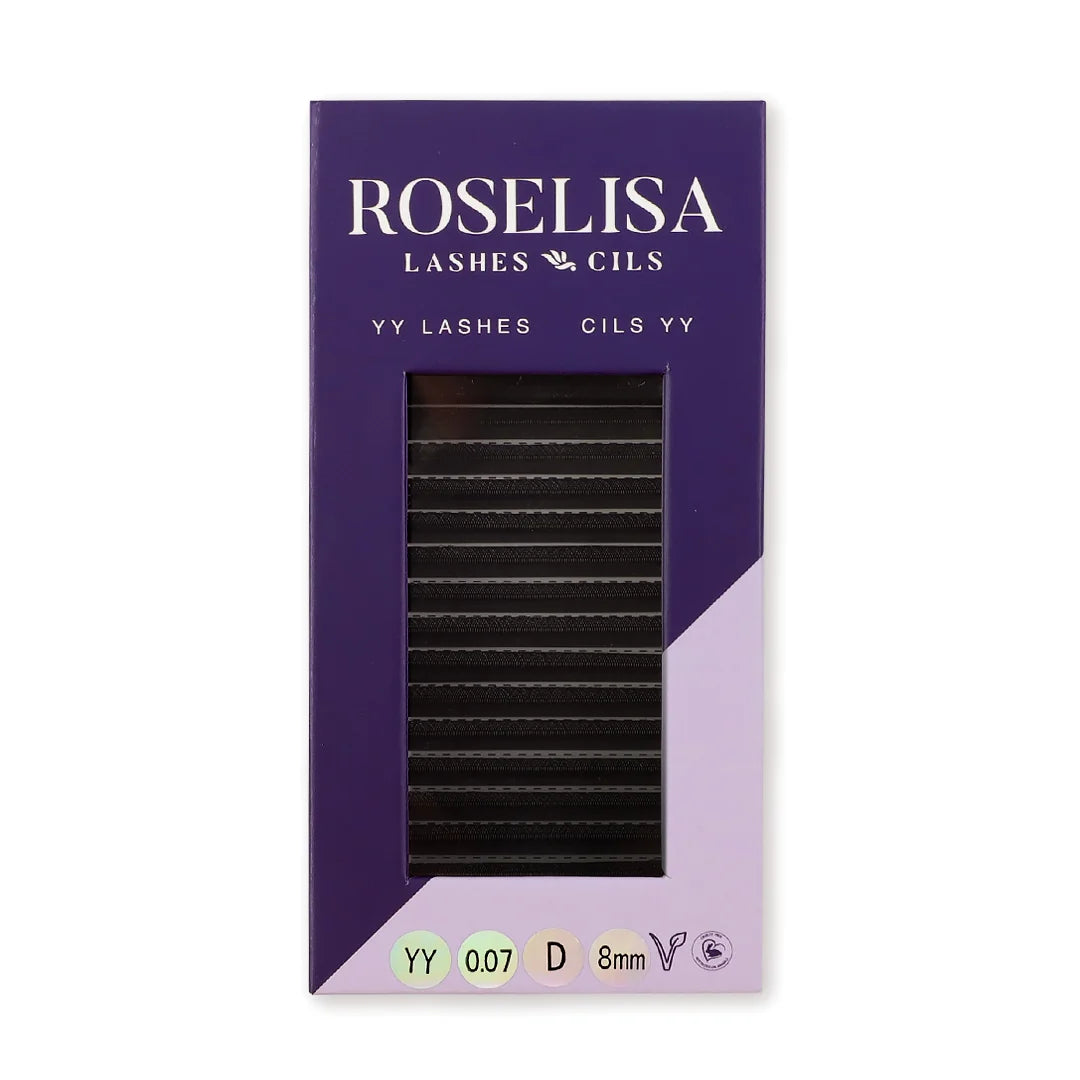 A package of Roselisa Lashes Cils 'YY' eyelash extensions, featuring a purple and lavender box with a clear window showing the black lash strips inside.
