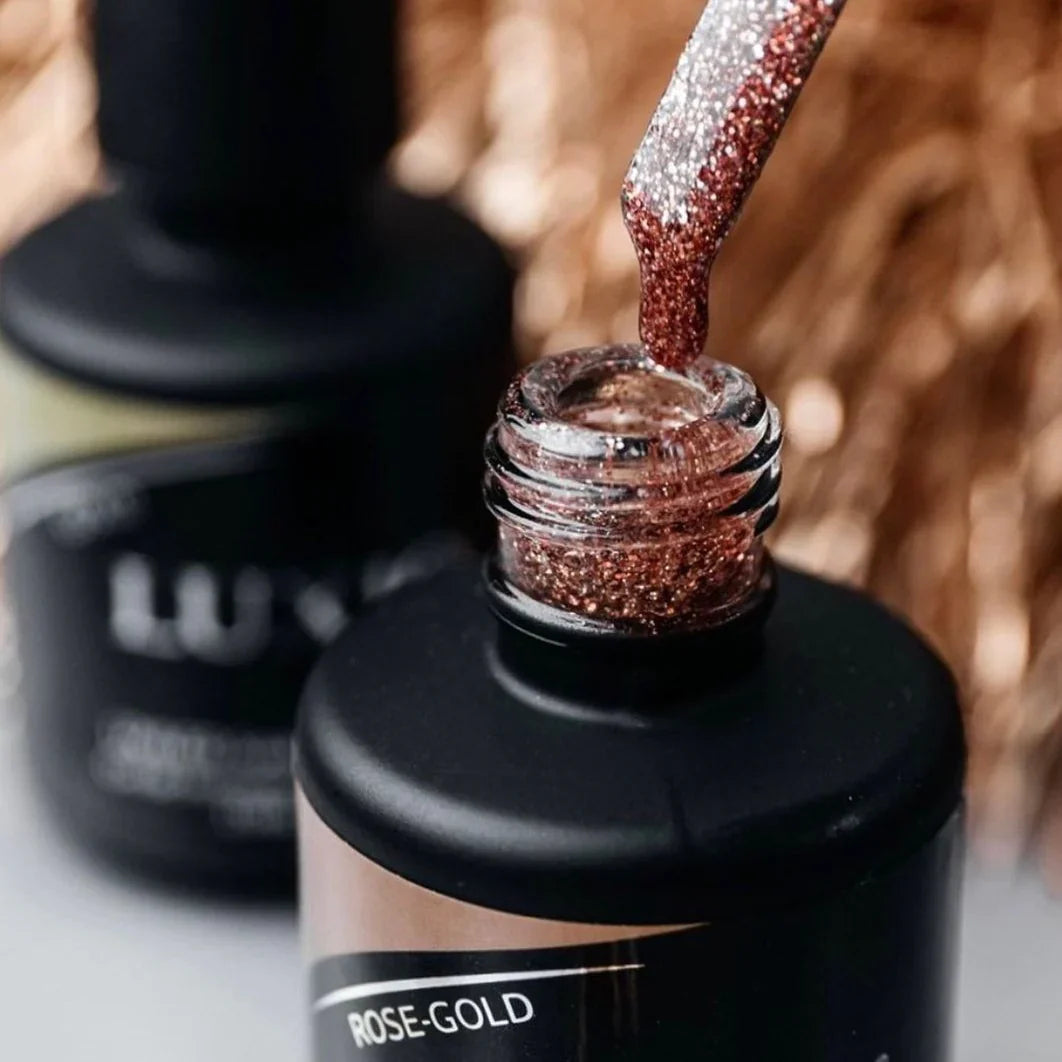 Open Akzentz Luxio Rose Gold gel bottle showing glitter gel