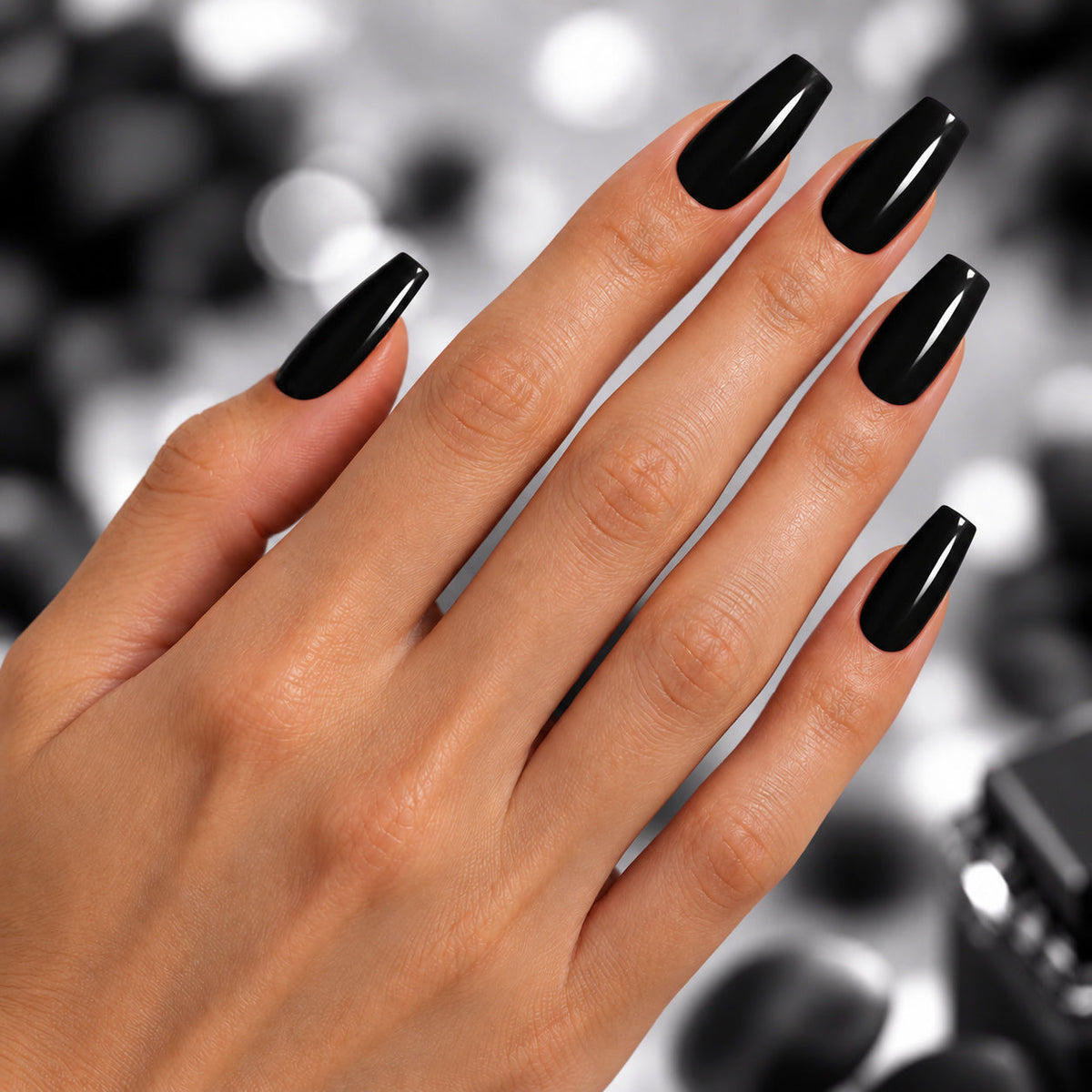 BEMI Creami Blackout B01 nails in a color photo.
