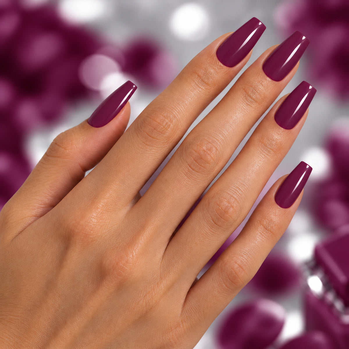 BEMI Creami Sangria F09 nails in a color photo.