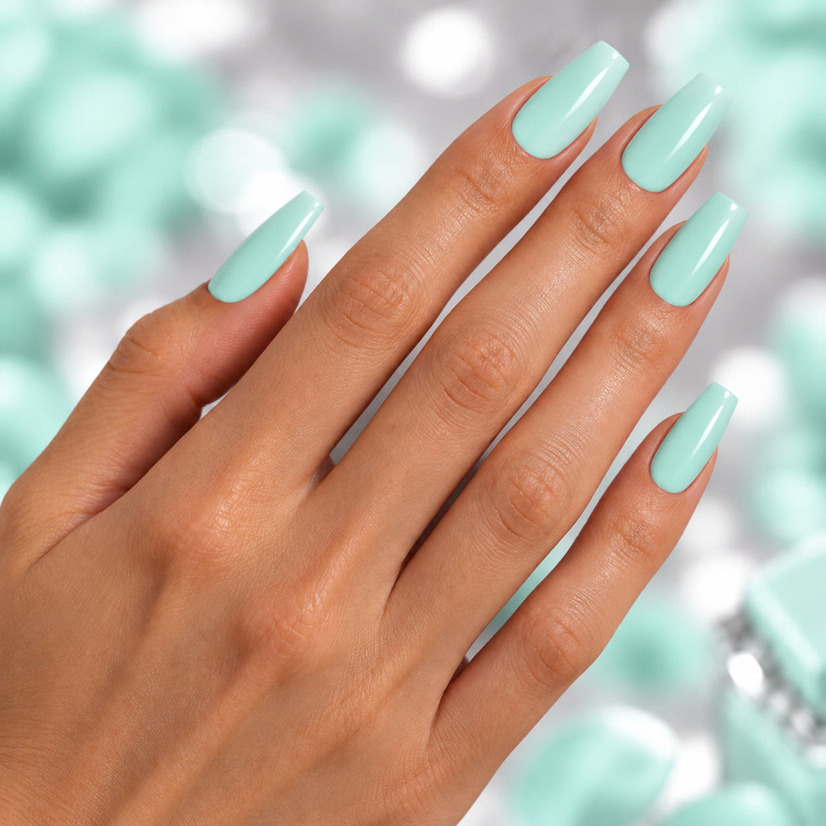 BEMI Creami Zephyr O09 nails in a color photo.