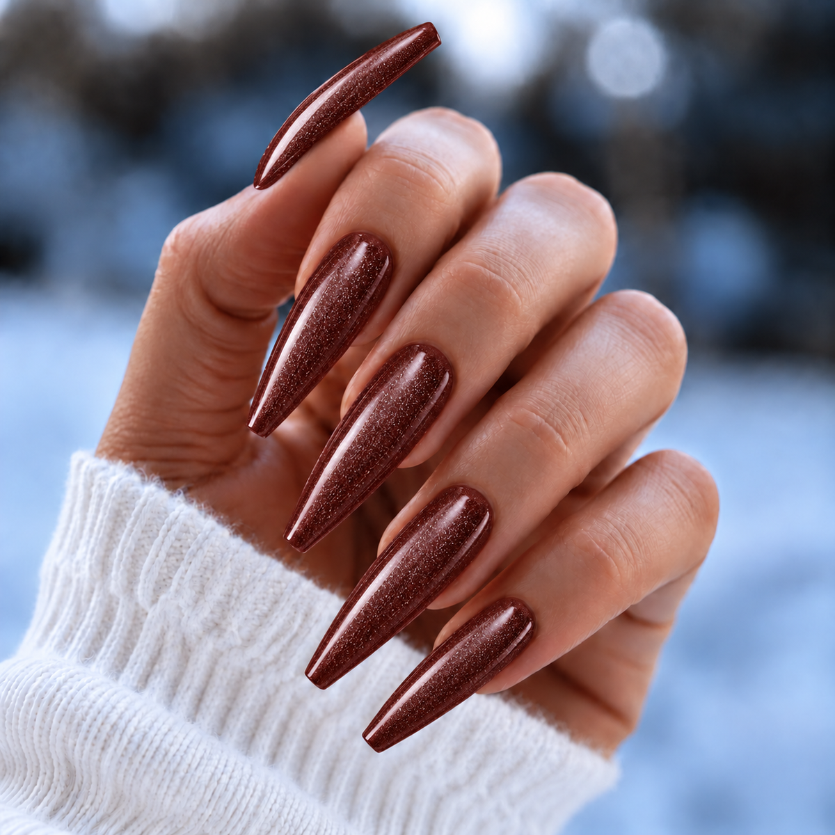 BEMI Shimmer Huntress nails in a color photo.