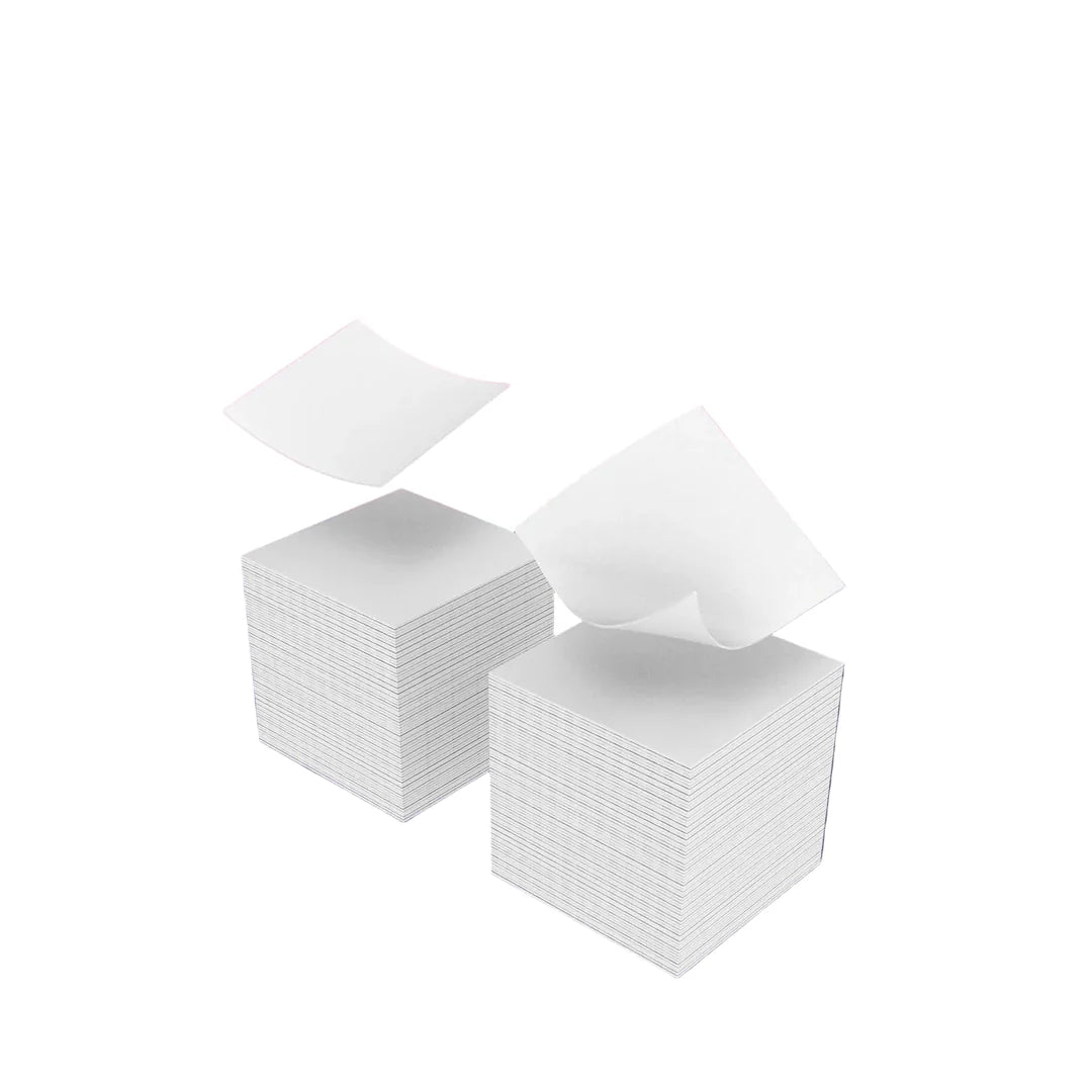 Three stacks of white paper on a white background