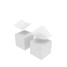 Three stacks of white paper on a white background