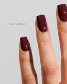 Akzentz Luxio Bordeaux gel polish shown on manicured nails