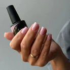 Akzentz Luxio Bouquet 15 mL gel polish bottle shown with a manicure