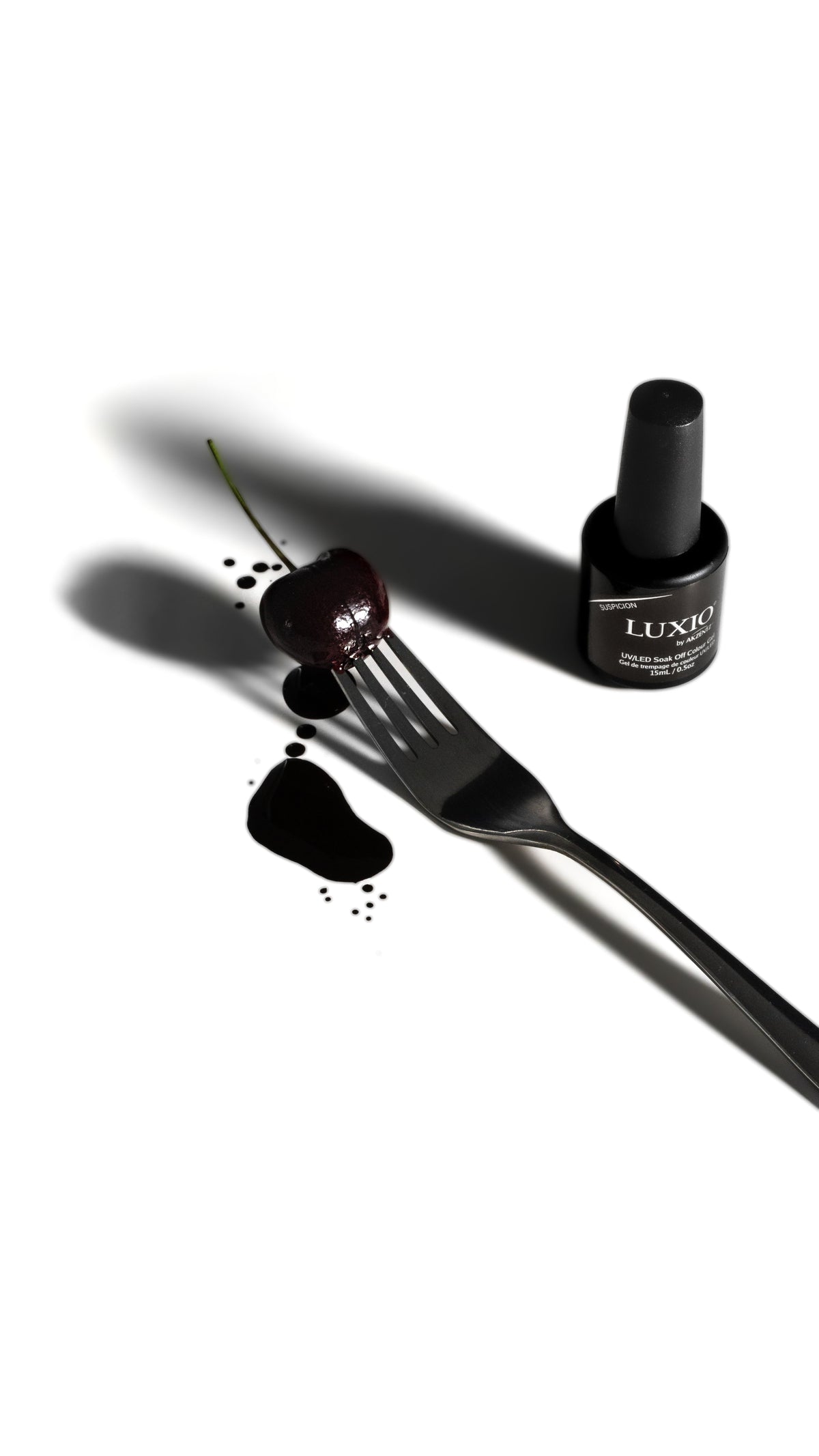 Akzentz Luxio Suspicion 15 mL gel bottle with dark brown gel detail