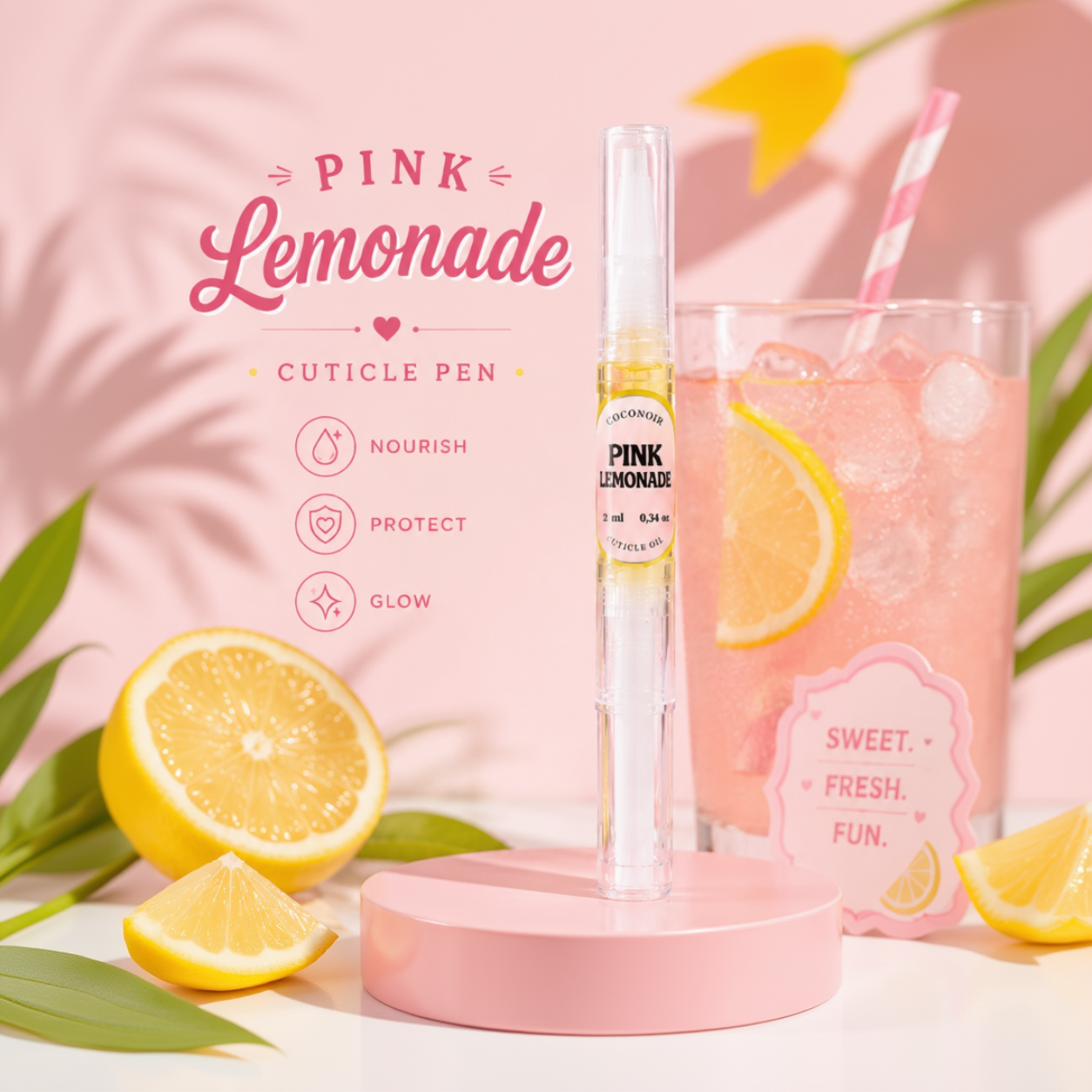 Pink lemonade cuticle pen with a glass of pink lemonade and lemons on a pink background.