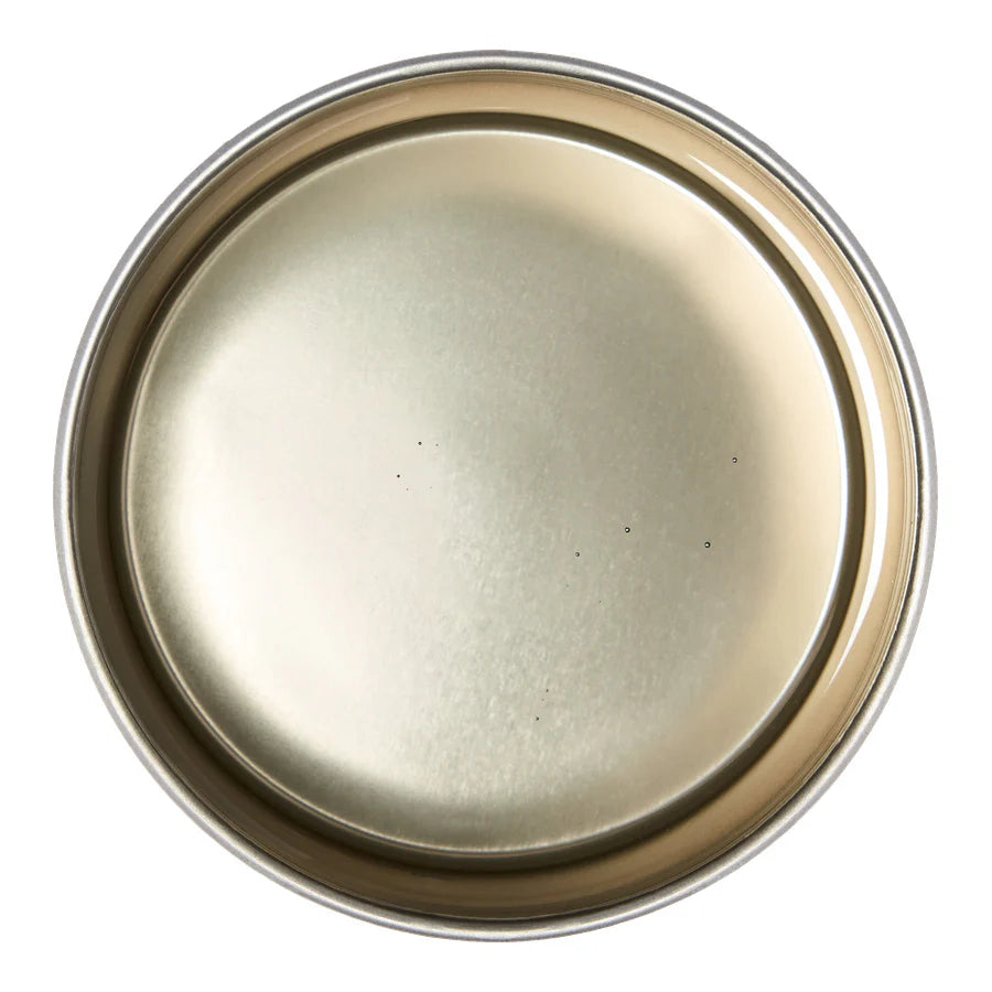 Round metal lid on a white background