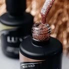 Open Akzentz Luxio Rose Gold gel bottle showing glitter gel