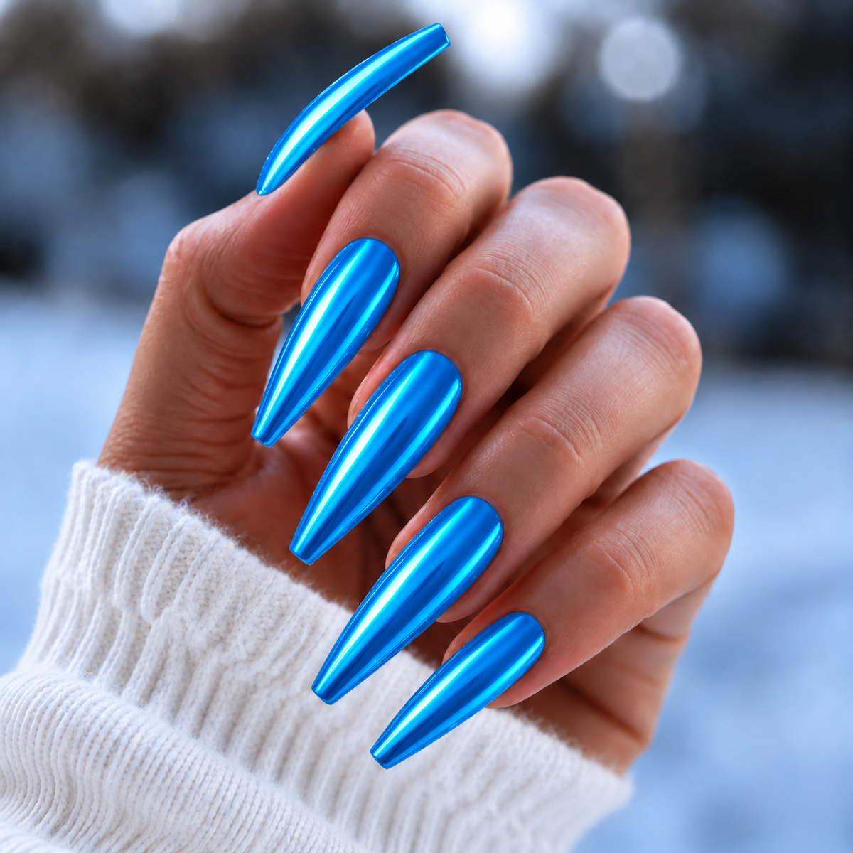 BEMI Chrome Neo Blue nails in a color photo.