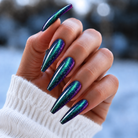 BEMI Chrome Oil Slick Holo nails in a color photo.