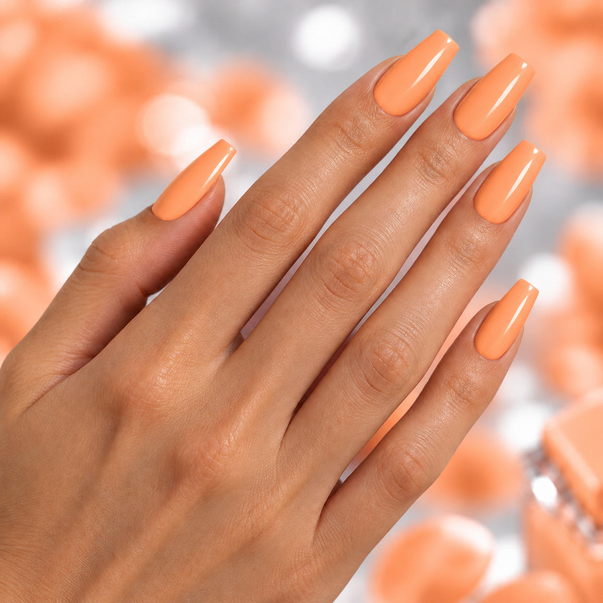 BEMI Creami Habanero O06 nails in a color photo.