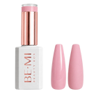 A bottle of BE-MI Beauty Box gel nail polish with a metallic rose gold cap and a white base, shown next to two glossy pink nail tips on a light gray background.