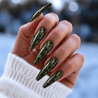 BEMI Metal Leaf Evergreen nails in a color photo.