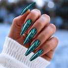 BEMI Metal Leaf Techno nails in a color photo.