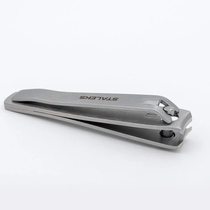 Metallic nail clipper on a white background