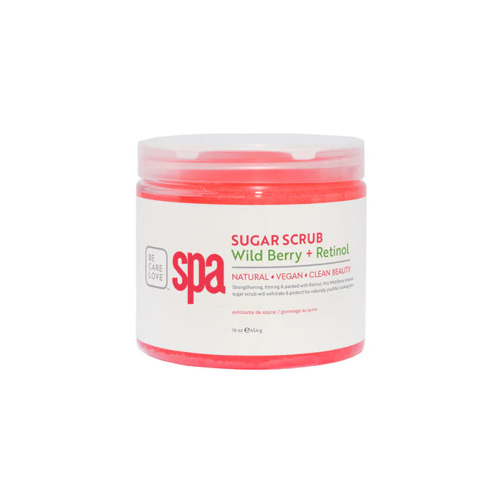 Jar of sugar scrub with 'spa' branding on a white background