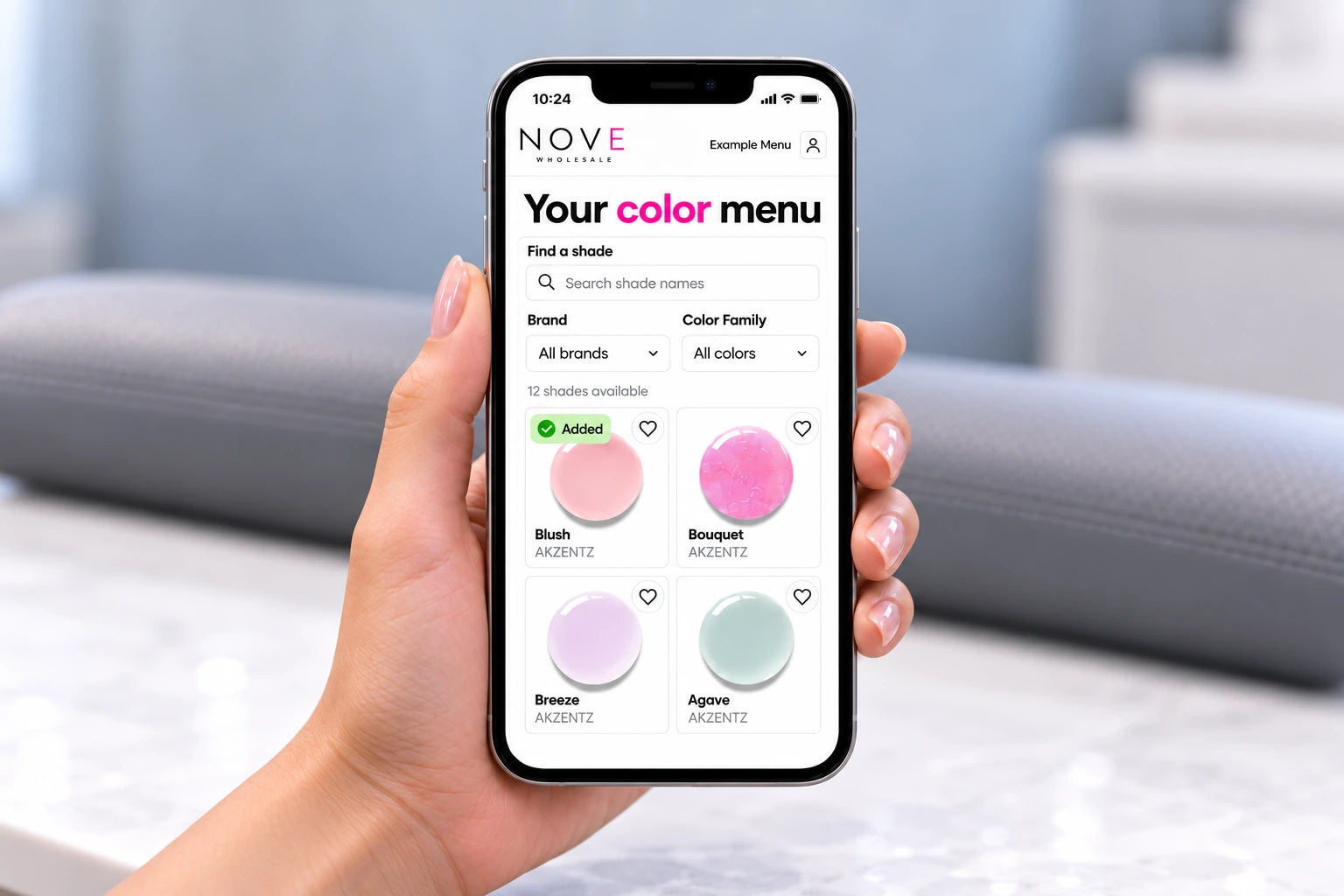 A hand holding a phone displaying an example color choices menu.